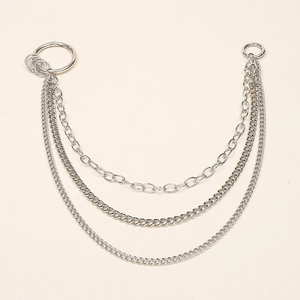 Detailed macro view of triple-layered silver metal pants chains with large O-ring connectors