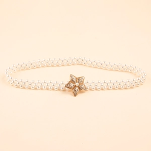 Elegant double-row pearl waist belt featuring a gold rhinestone star buckle for dresses