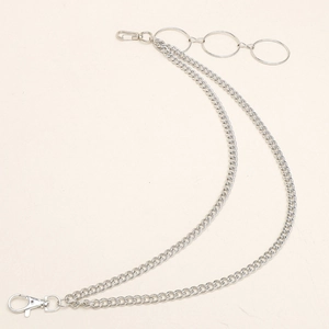 Detail view of double-layer silver wallet chain with triple ring accents and lobster clasps