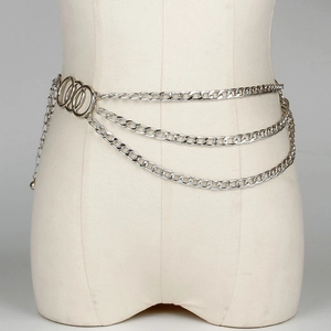 Detail of a three-layer silver metal waist chain with triple interlocking rings for women