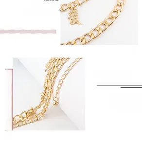 Detailed close-up of golden Chinese dragon pendant and multi-layer metal waist chain belt