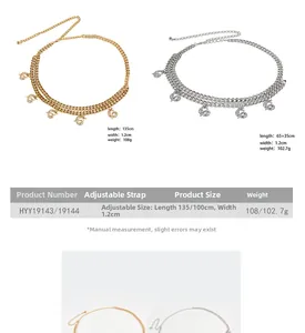 Close-up of double layer gold and silver waist chains with detailed dragon pendants