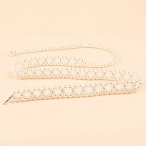 Elegant woven pearl waist chain with metal clasp for dresses and fashion accessories