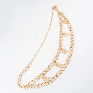 Detail of layered gold metal waist chain with five traditional Chinese dragon pendants