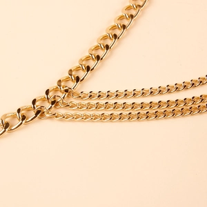 Chic multi-layered golden metal waist chain featuring bold and fine Cuban link textures