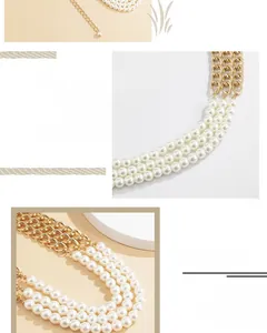 Detailed view of the triple-layer pearl and gold chain waist belt with adjustable lobster clasp