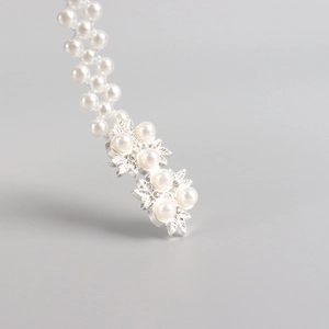 Elegante witte parel elastische tailleketing voor dames met zilveren metalen gespen
