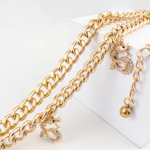 Double-layered golden waist chain with rhinestone dragon pendants for dresses