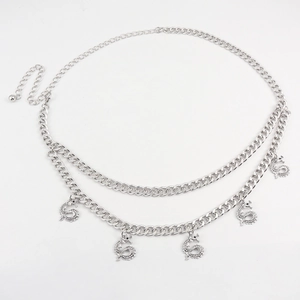 Detail of silver double-layered waist chain featuring intricate dragon pendants and clasp