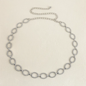 Elegant silver metal waist chain belt with twisted oval links and adjustable clasp for women