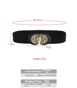 Detail of vintage black elastic belt with 11cm gold hollow floral metal buckle closure