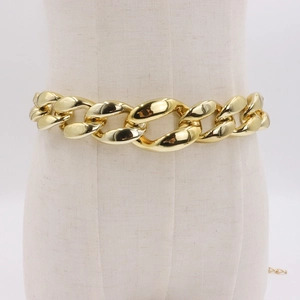 Punk style chunky gold oval link waist chain belt with a high-polished metallic finish
