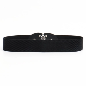 Close-up of vintage bronze butterfly buckle on black elastic cinch belt for dresses