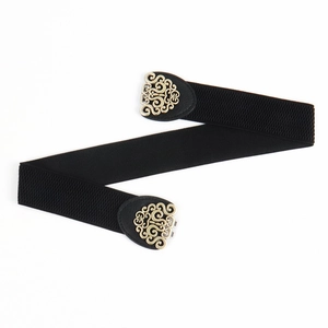 Vintage elastic black waist belt with ornate golden heart-shaped carved metal buckle