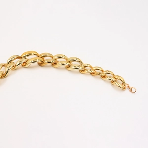 Punk style chunky gold curb chain body jewelry with secure lobster clasp fastening