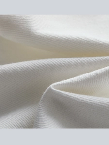 Detailed texture of white thick twill cotton denim fabric for men's loose straight jeans