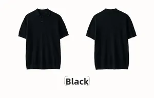 Detailed close-up of black cotton knit polo shirt with honeycomb texture and ribbed hem