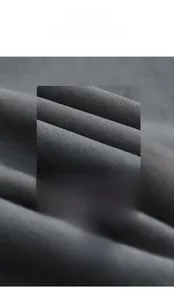 Macro detail of soft grey polyester-cotton knit fabric with fine ribbed texture for comfort