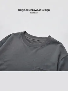 Deep grey crew neck cotton T-shirt featuring high-quality chest pocket and reinforced collar