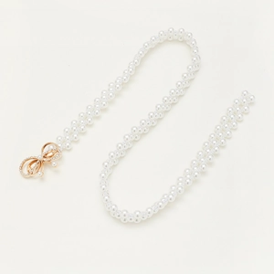 Elegant multi-strand pearl elastic belt featuring a gold rhinestone bow buckle for dresses