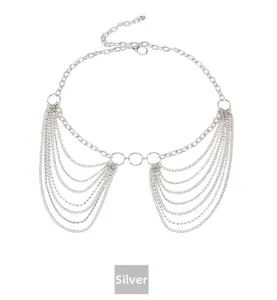 Macro view of multi-layer silver body chain with double rhinestones and fringe detail