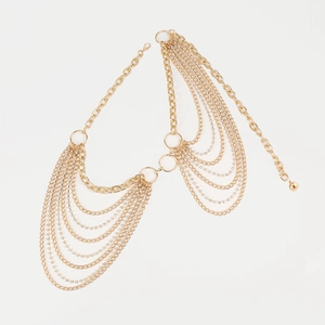 Detail of multi-layer gold body chain with shimmering rhinestones and adjustable lobster clasp