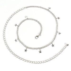 Detail of silver star body chain with lobster clasp and adjustable metal link layers
