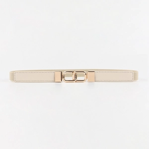 Close-up of beige elastic waist belt featuring a stylish golden double-ring buckle