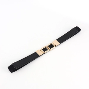 Detail of a thin elastic waist belt featuring a polished gold double ring metal buckle