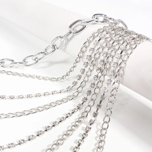 Macro shot of multi-layered silver chains with sparkling rhinestone accents for women