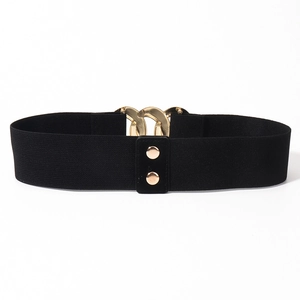 Detail of black wide elastic belt with dual gold metal rings and decorative rivets