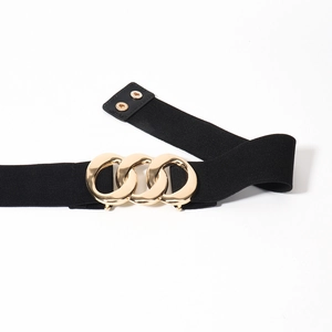 Detail of black elastic waist belt with modern golden triple ring buckle and snap closure