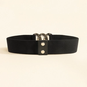 Close-up of black elastic wide belt featuring silver metal interlocking buckle with rivets