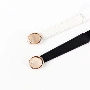 Elegante schmale Stretch-Taillengürtel in Schwarz und Weiß mit Rosen-Opal-Schnallen