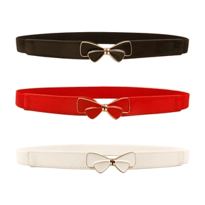 Women's elastic waist belts with enamel bow buckles in black, red, and white colors