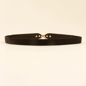 Detail of a black elastic waist belt featuring a gold metal buckle and twill texture