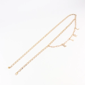 Golden double-layer metal waist chain featuring Eiffel Tower KARL letter pendants