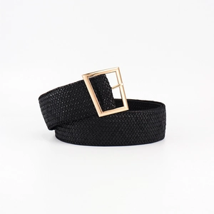 Close-up of black braided elastic belt with a polished gold square buckle on white background