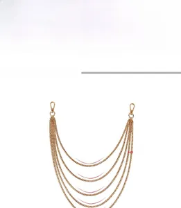 Detail view of 5-layer gold punk waist chain showing various lengths and lobster clasps