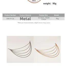 Macro view of five-layered gold and silver punk style waist chains with lobster clasps