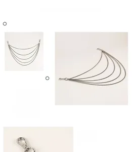 Detailed macro view of multi-layered silver punk waist chain with sturdy lobster clasps