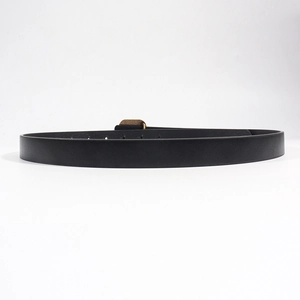 Detailed view of black leather belt featuring a golden square buckle with brown pattern