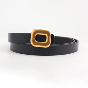 Slim minimalist black leather belt for women with elegant rectangular gold metal buckle