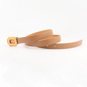 Detail of slim khaki PU leather belt with matte gold rectangular buckle and punch holes