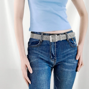 Ceinture punk en maille argentée avec boucle en strass pour femme sur jean