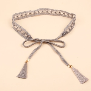 Gray lace woven waist belt with bohemian tassels and gold accents for women dresses