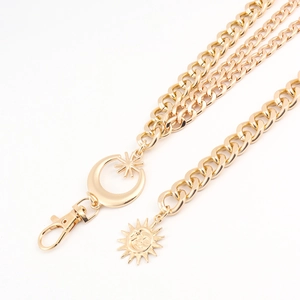 Three-layer gold metal waist chain with moon and sun pendants and lobster clasps