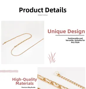 Detail of gold metal waist chain with pearls and woven links for summer dresses