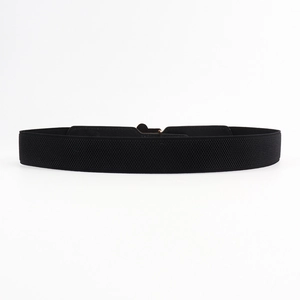 Detail of high-elasticity black corset belt featuring refined cross-weave texture