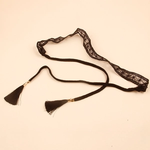 Bohemian black lace woven belt for women featuring silk tassels and gold accents